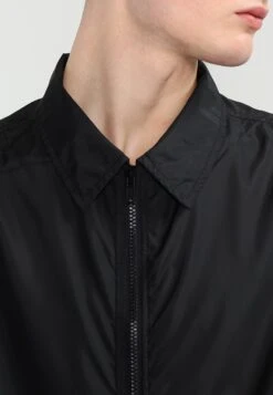 URBAN CLASSICS Coach Coat - Trenchcoat - Black -Winter Menswear Store 09034012306348b0ac5b16922c007775