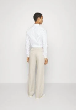 Tiger Of Sweden Trey - Trousers - Beige 7 Tiger Of Sweden Trey - Trousers - Beige -Winter Menswear Store 298db34650414a41877aece39cd046d0 scaled