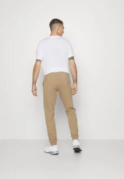 Puma Better Essentials - Tracksuit Bottoms - Toasted -Winter Menswear Store 4d638cdaefa74e1b9ca46aaa2dc90d9a scaled