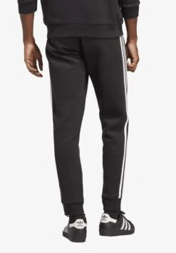 Adidas Originals 3 Stripes- Tracksuit Bottoms - Black -Winter Menswear Store 7dfe73f7e75941bdb338ba96c4b914fb scaled
