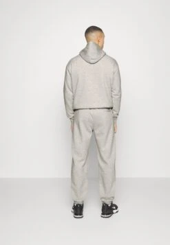 Champion Pants Unisex - Tracksuit Bottoms - Grey Melange -Winter Menswear Store b05e2b9041bb4998b250bf81dfe5f3e3 scaled