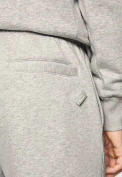 Champion Pants Unisex - Tracksuit Bottoms - Grey Melange -Winter Menswear Store b7cfe7afc0894c4e8b51ab998bd1859b scaled