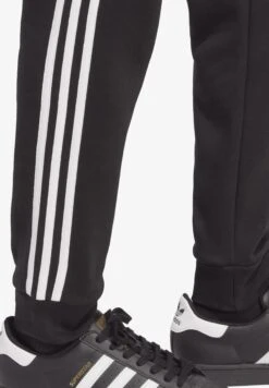 Adidas Originals 3 Stripes- Tracksuit Bottoms - Black -Winter Menswear Store d6493d850b5a493289148dad2efa5810 scaled